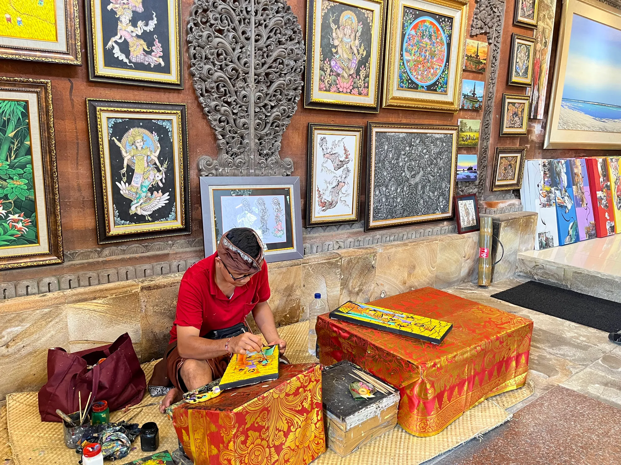 Artist working at the Dewa Putu Toris Art Gallery