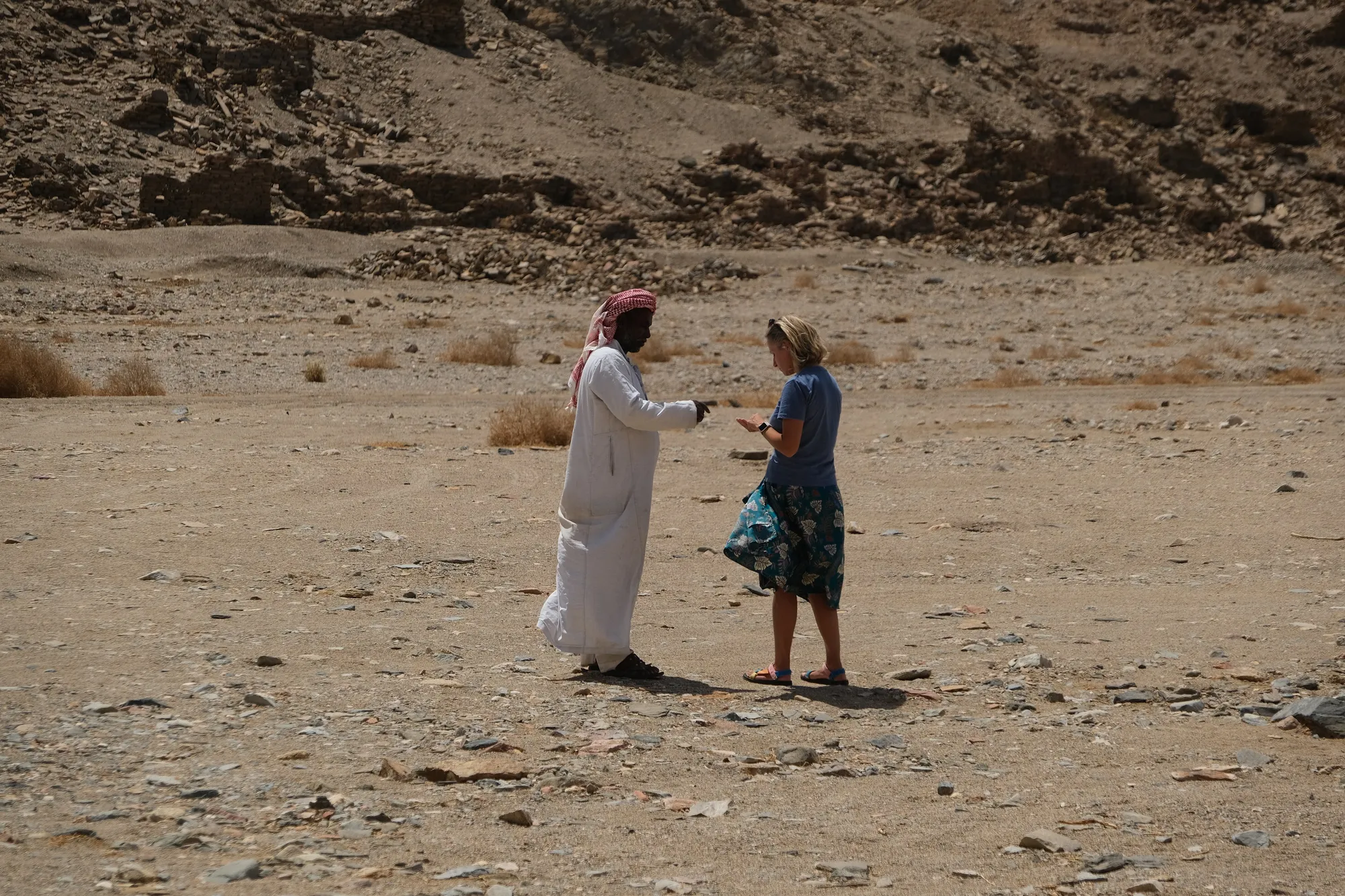 From left to right: Mustafa showing us emeralds he found on the wadi's floor, Sikait miners' living quarters and workshops