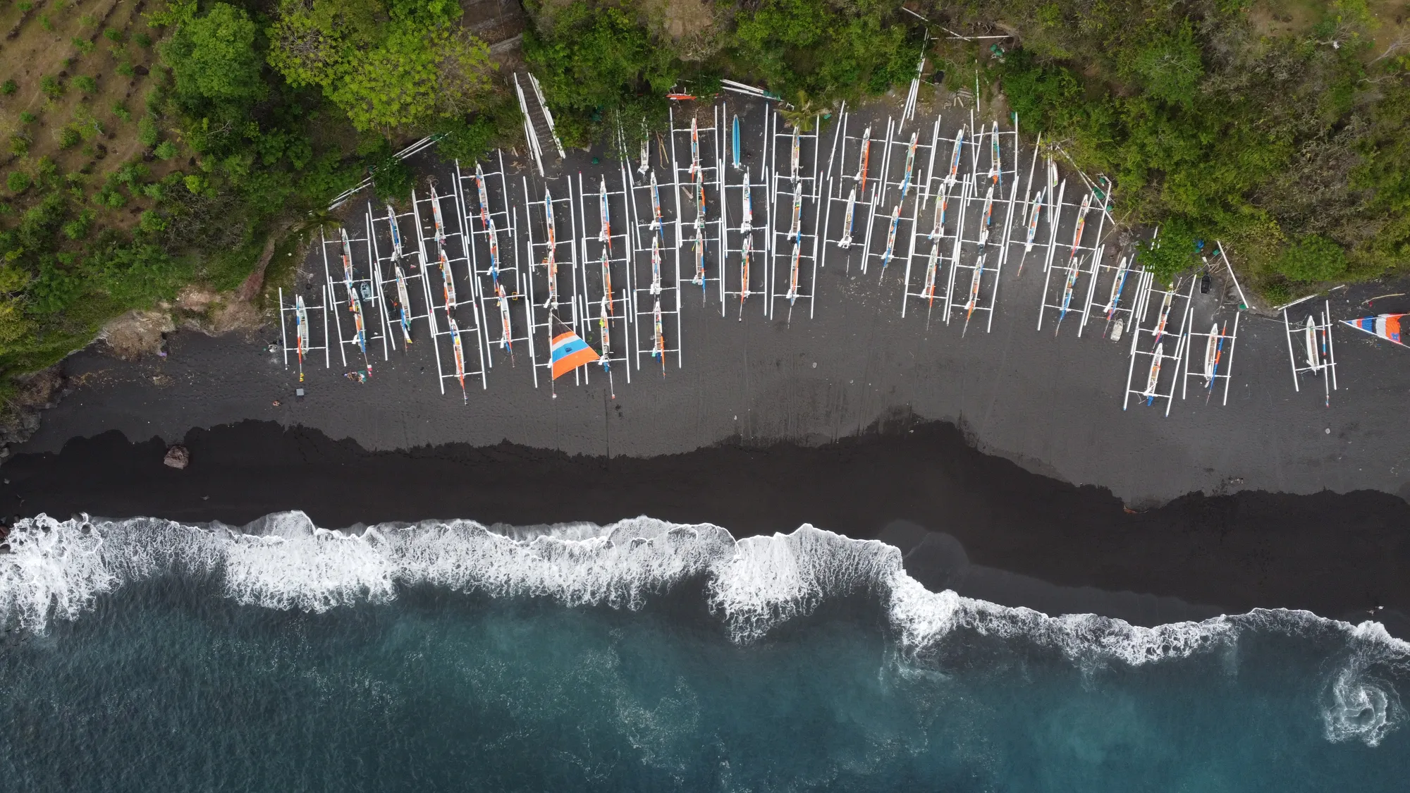 Pantai Pasir Hitam, secluded black sand beach